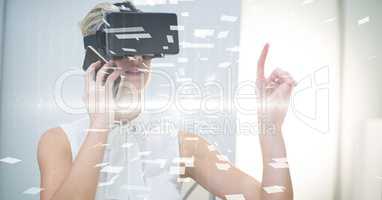 Digital composite image of businesswoman with VR glasses and smart phone
