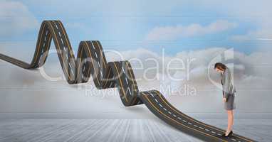 Digitally generated image of businesswoman standing on wavy road in sky