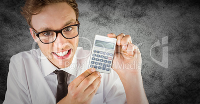 Nerd with calculator against grunge background