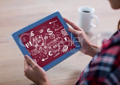 Woman with blue tablet showing white business doodles and maroon background