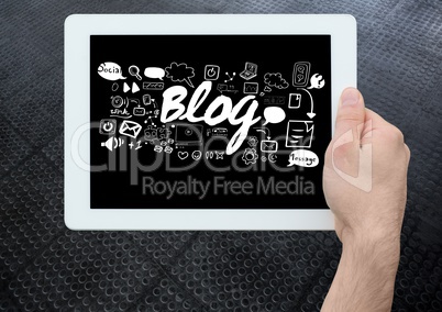 Hand holding tablet with Blog text with drawings graphics