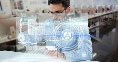 Digitally generated image of businessman tiouching futuristic screen while working in office