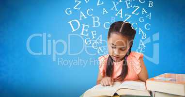 Digitally generated image of girl studying with letters flying in blue background