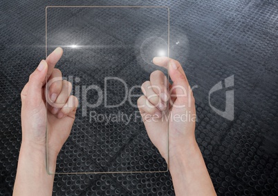 Hand holding glass tablet