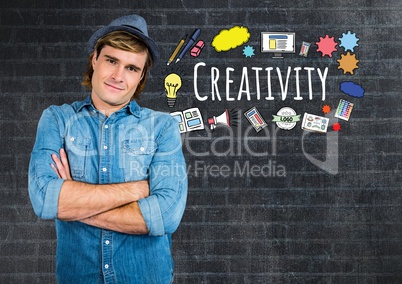 Creative man with Creativity text with drawings graphics