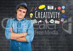 Creative man with Creativity text with drawings graphics