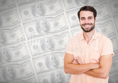 Man smiling with arms folded i front of money notes