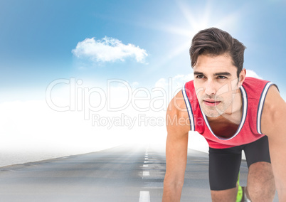 Male runner on road and sky with sun