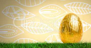 Easter Egg in front of leaf pattern