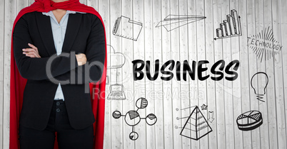 Business woman superhero mid section with arms folded against white wood panel with business doodles
