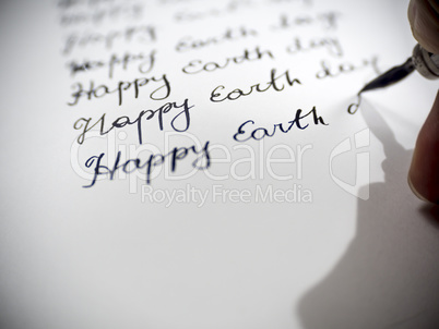 Happy earth day calligraphy and lattering.