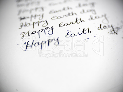 Happy earth day calligraphy and lattering.