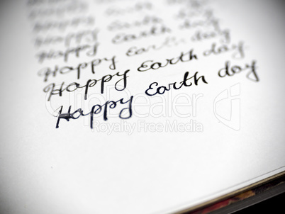 Happy earth day calligraphy and lattering.