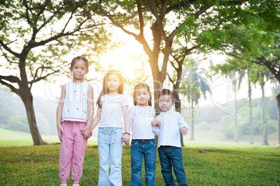 Group of Asian children outdoor portrait.