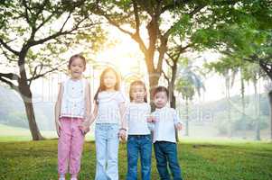 Group of Asian children outdoor portrait.