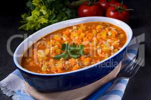 fish with vegetables in tomato sauce