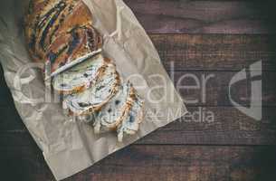 Bun with poppy seeds on kraft paper