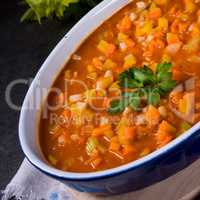 fish with vegetables in tomato sauce