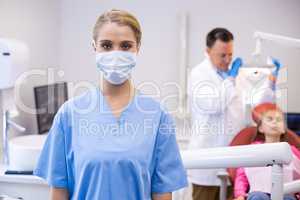 Portrait of female nurse wearing surgical mask