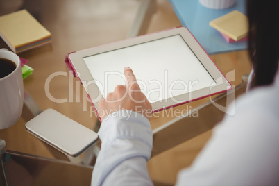 Close up of woman using tablet