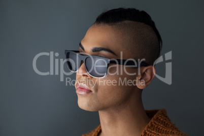 Close up of transgender woman wearing sunglasses