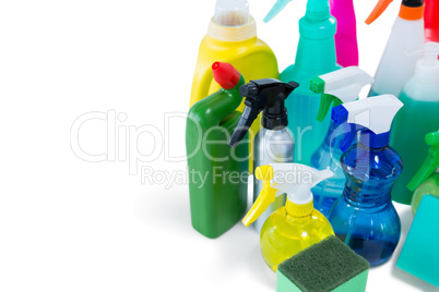 High angel view of colorful spray bottles with sponges and gloves