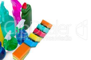 High angle view colorful sponges and spray bottles