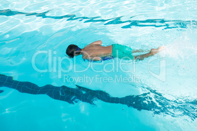 Boy swimming in the pool