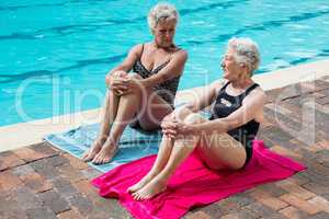 Senior women interacting with each other while relaxing