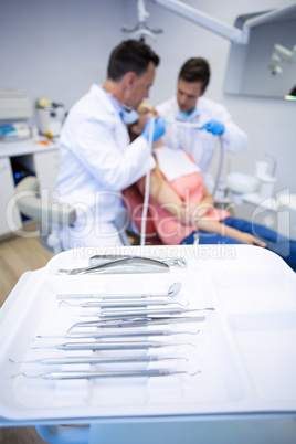 Various dental tools kept in tray