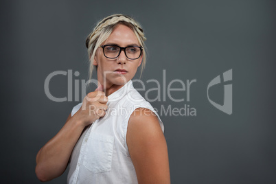 Transgender woman with hairstyle looking away