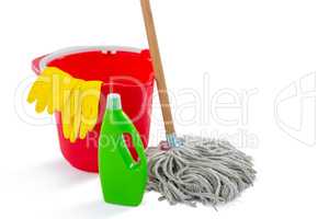 Close up of cleaning products and mop with bucket