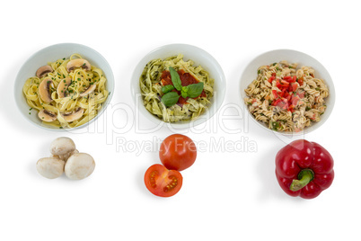 Mushroom with tomato and red bell pepper by various pastas served in bowl