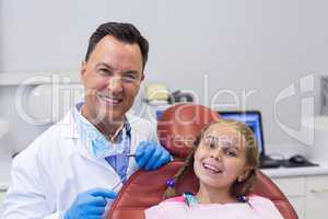 Dentist with young patient