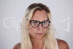 Transgender woman wearing eyeglasses