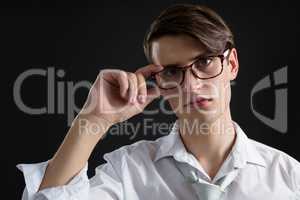 Androgynous man posing in spectacles