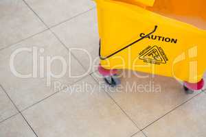 High angle view of sign on mop bucket