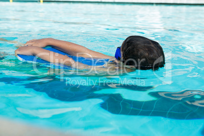 Boy swimming in the pool