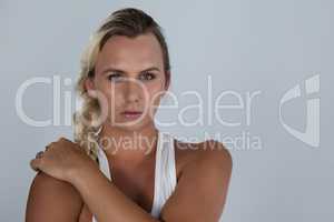 Portrait of confident transgender with braided hair