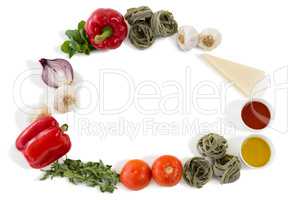 Vegetables with pasta arranged on white background