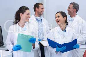 Dentists interacting with each other