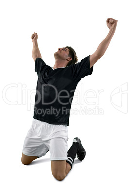 Football player celebrating his victory