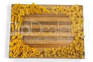 Various pasta on cutting board