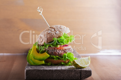 Burger with salad, onion