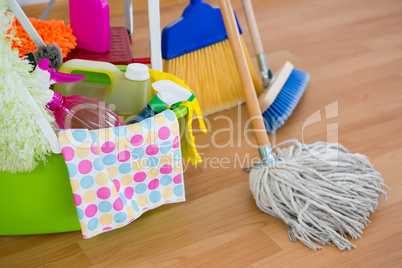 High angle view of cleaning equipment on hardwood floor