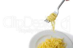 High angle view of spaghetti in plate with fork