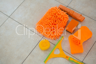 High angle view of orange cleaning products