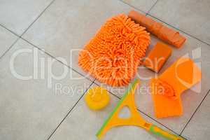 High angle view of orange cleaning products