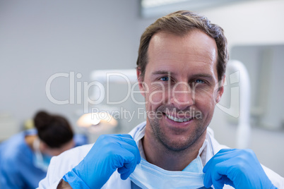Portrait of smiling dentist