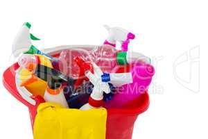 High angle view of cleaning spary and bottles in bucket